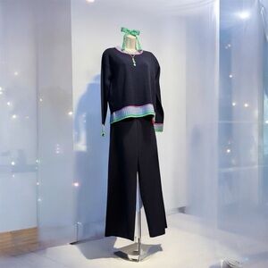 Lisa Todd navy sweater with neon crochet elements